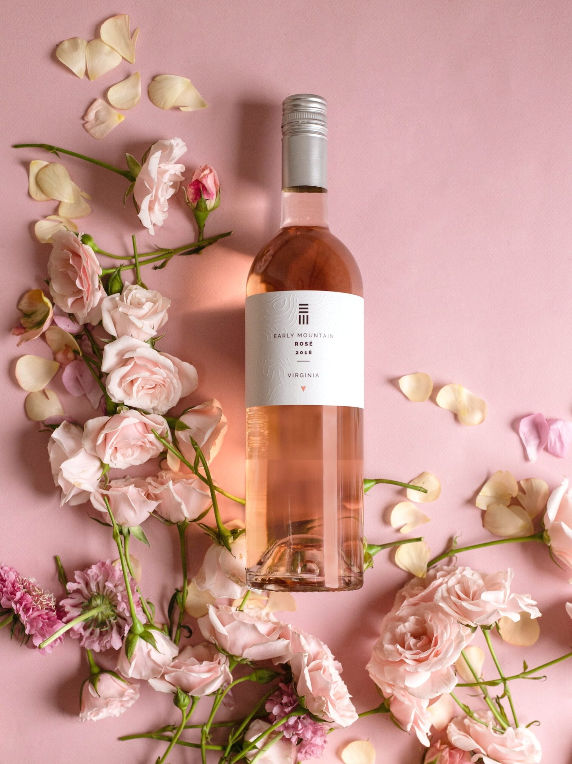 rose oil crossword clue