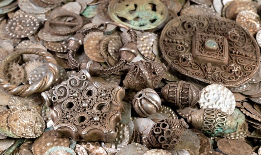 Old Greek Coin Crossword Clue